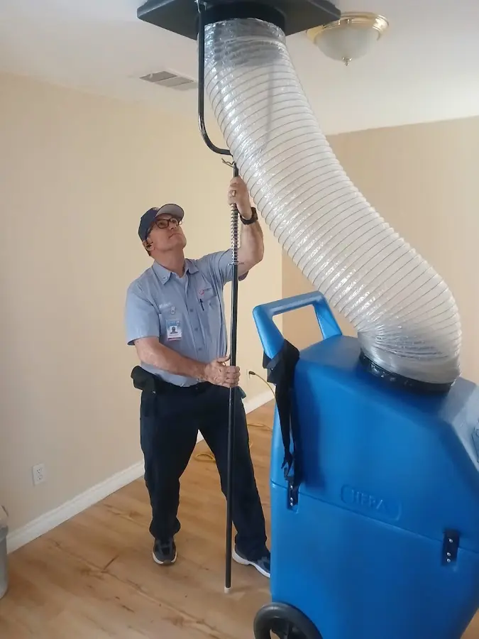 HVAC Installation technician using HEPA equipment in Larkspur